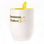 A cup with a spoon. Yellow (250 ml)