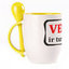 A cup with a spoon. Yellow (250 ml)