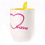 A cup with a spoon. Yellow (250 ml)