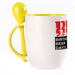 A cup with a spoon. Yellow (250 ml)